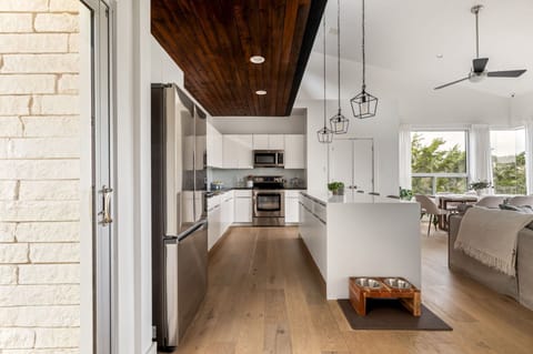Bright, modern kitchen with a large island for meals and conversation