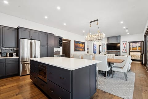 Your gourmet kitchen and elegant dining area create the perfect space for memorable meals and conversations with loved ones.