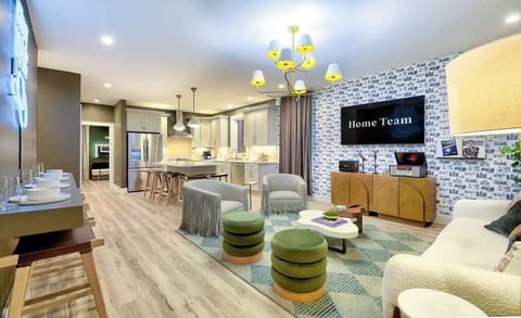 The ultimate hangout zone! Movie nights, board games, or just soaking up the cozy atmosphere—this living room has your name written all over it.