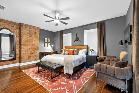 Escape to our serene Master Suite, your private retreat featuring a plush King b