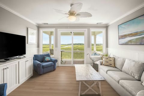 Living Room with that view!!  All new LVP flooring through entire home