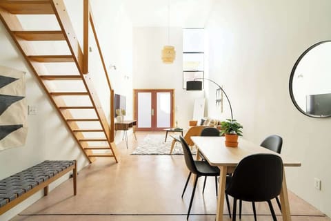 Curl up with a book or enjoy a movie night in our cozy, beautifully lit living and dining room!
