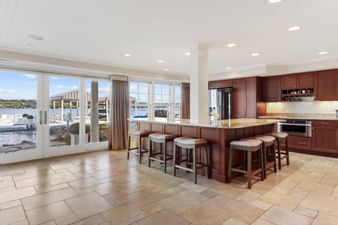 Main floor prep kitchen with wet bar