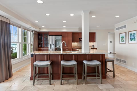 Main floor prep kitchen with seating