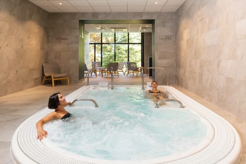 Sauna, hot tub, steam room, body scrubs, facials, massages