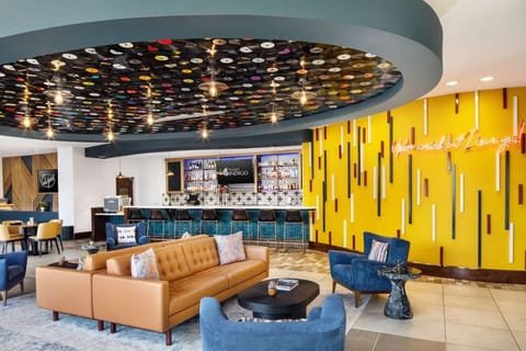 Vinyl-covered ceiling, cozy seating, and a full bar setup