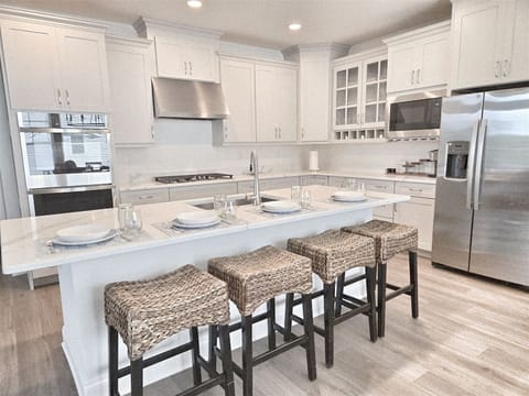 Chef Inspired Kitchen: Quartz countertops, premium cabinetry