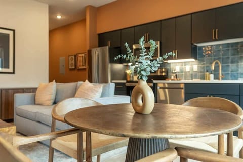 Round dining table with plant centerpiece