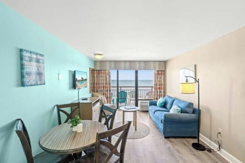 Relax in this oceanfront living room at Landmark 838.