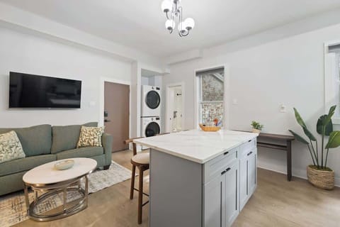 Open & Functional with easy flow between kitchen and living room.
