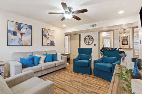 Unwind in the cozy living room with smart TV and comfortable seating after exploring Birmingham.