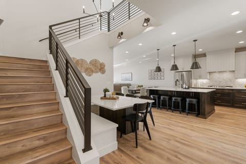 Large kitchen and dining area for cooking and eating.