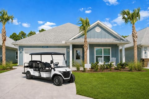 Charming coastal home with easy access to pools, trails, the beach and free use of a 6-seater golf cart & 4 bikes