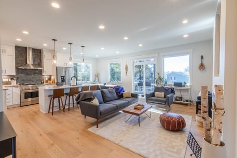 Light-filled living space with expansive windows and ocean views—your front-row seat to coastal calm.