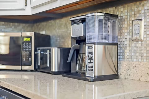 Fuel up for the day at the fully stocked coffee station.