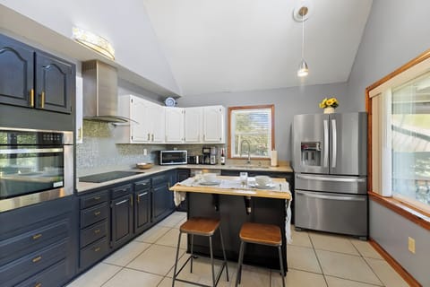 The open floor plan keeps everyone connected from the kitchen to the lounge.