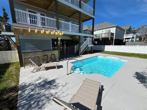 Soak in the outdoors with a private pool and poolside bar