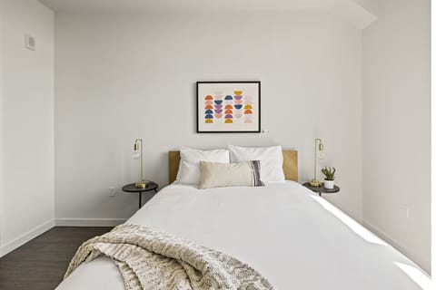 Unwind in crisp linens and a calm, minimalist retreat.