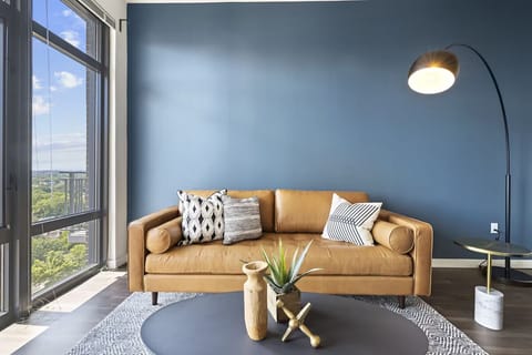 Stretch out on the sofa and savor sun-drenched views.