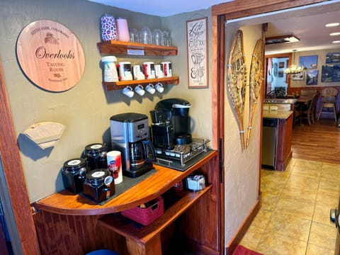 Dedicated coffee bar with drip and single‑serve options, mugs, and everything needed for a great morning.