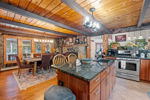 A warm, spacious kitchen made for group cooking and slow mornings