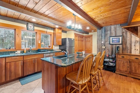 Prep, cook, and snack with the woods right outside the windows