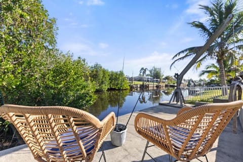 Waterfront loungers overlooking the canal, perfect for sunset drinks