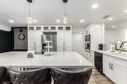 Fully stocked kitchen ready for home cooking.