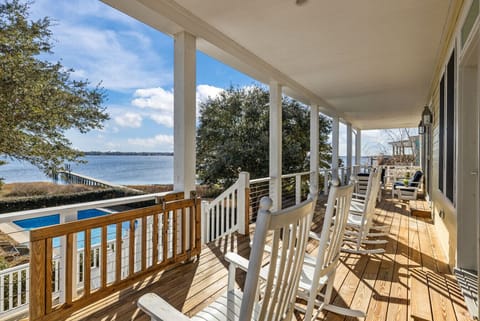 Stunning coastal waterfront home with private pool and dock and lift