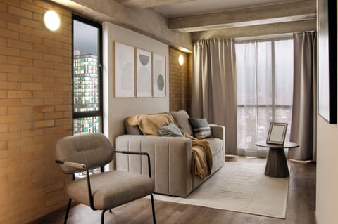 Deluxe Apartment, 1 Double Bed with Sofa bed, Ensuite, City View | Living area | Smart TV