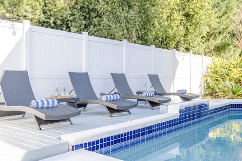 The pool area is completely fenced in and has 4 lounge chairs for perfect relaxations