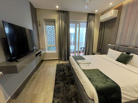 Standard Apartment, Balcony, Garden View | Desk, laptop workspace, blackout drapes, soundproofing