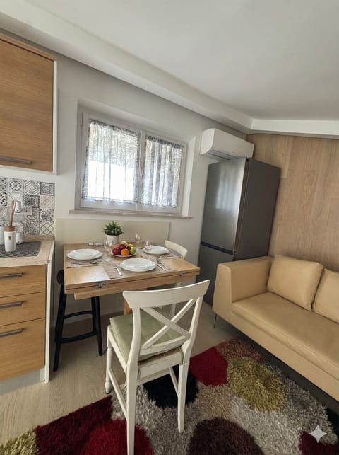 Deluxe Apartment, Valley View | Living area | 65-inch Smart TV with digital channels