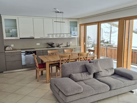 Furniture, Interior Design, Flooring, Floor, Couch, Wood, Room, Table, Wood Flooring, Chair