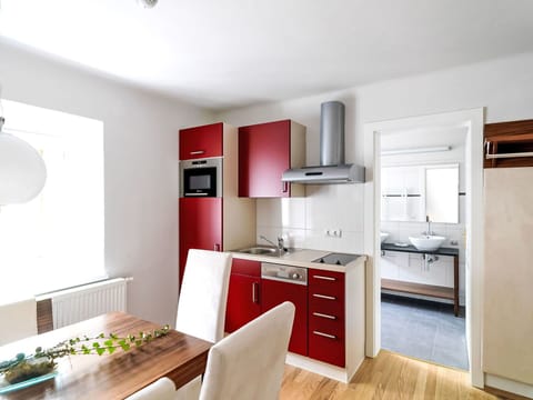 Furniture, Interior Design, Flooring, Kitchen, Kitchen Appliance, Major Appliance, Countertop, Cabinetry, Wood, Floor