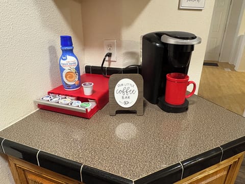 Coffee bar with a variety of coffee, sugar and creamer available.