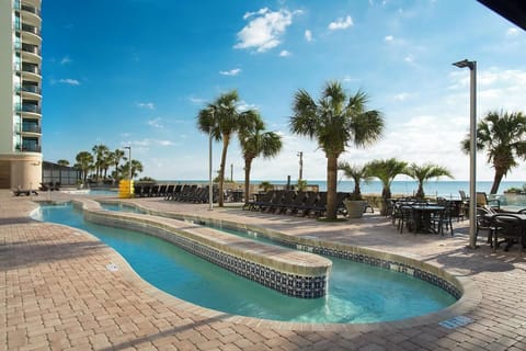 Float along the lazy river with sparkling ocean views.