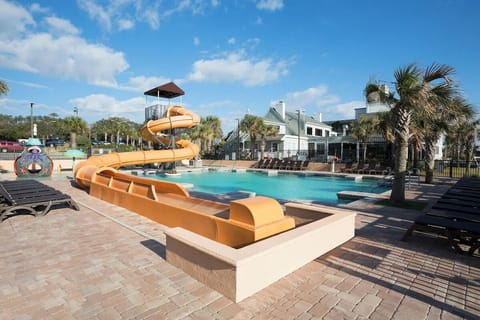 Race down the waterslide, then lounge under blue skies.
