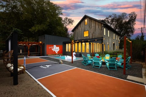 Play under the lights on your private pickleball court, surrounded by a fun, resort-style backyard atmosphere.
