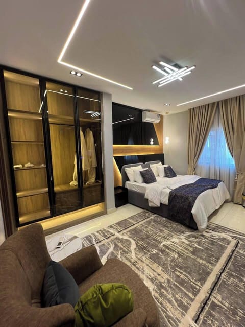 Deluxe Room, Balcony, City View | In-room safe, desk, laptop workspace, blackout drapes