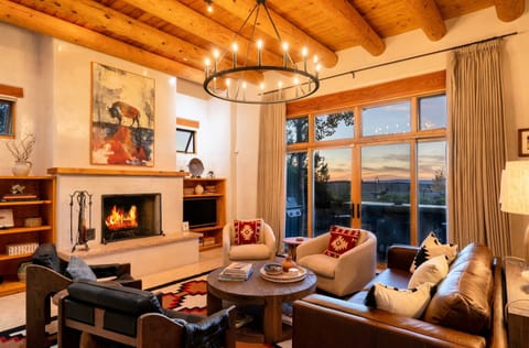 Mountain-view lounge with cozy fireplace