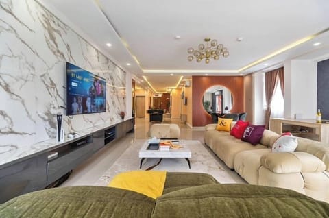 Superior Apartment, Balcony, City View | Living area | Flat-screen TV