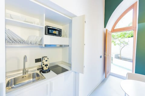 Triple Room | Living area | TV