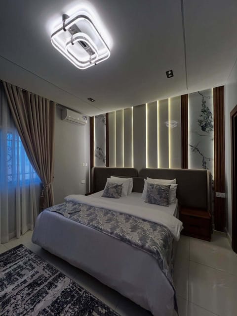Family Room, Balcony, City View | Desk, laptop workspace, blackout drapes, soundproofing