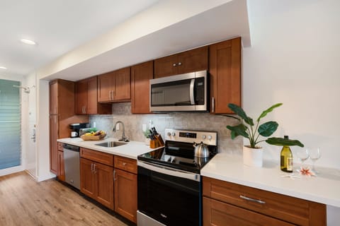 Enjoy cooking in your fully furnished kitchen with stainless steel appliances