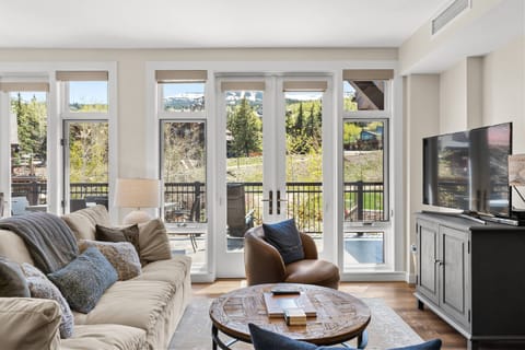 You will appreciate the snow covered peaks in the distance and green Aspen trees outside your door.