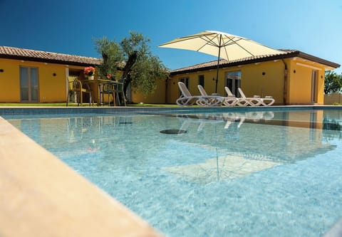 Seasonal outdoor pool, pool umbrellas, sun loungers