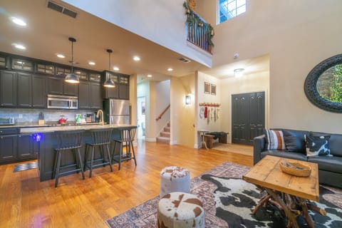 Open concept living, dining and kitchen area