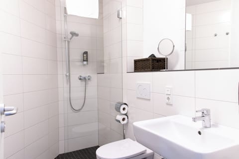 Shower, towels, soap, shampoo