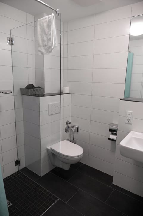 Shower, towels, soap, shampoo